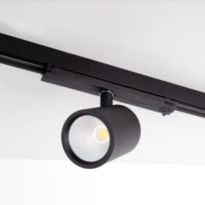 Spot LED cylindrique noir sur rail DALI avec réflecteur conique et source lumineuse centrale