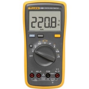 Multimètre numérique jaune à sélecteur rotatif affichant 220,8 V AC et bornes de mesure en façade