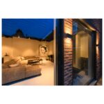 Applique murale LED noire au design ovale pour éclairage extérieur mural