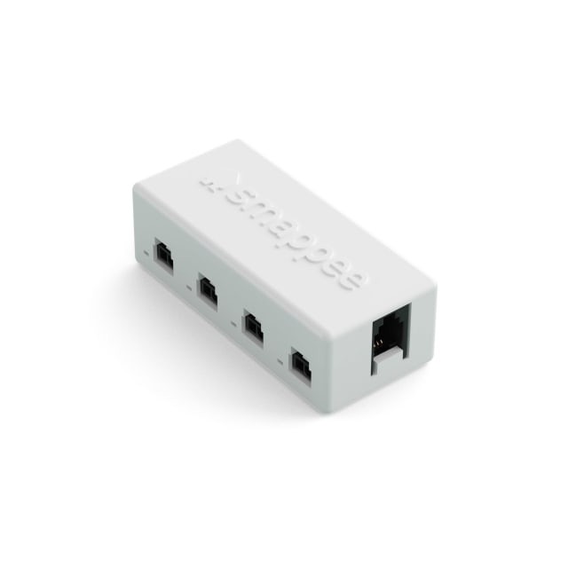 Smappee Hub i1-IAC-1 module CT Boîtier blanc rectangulaire avec quatre ports latéraux et connecteur RJ45