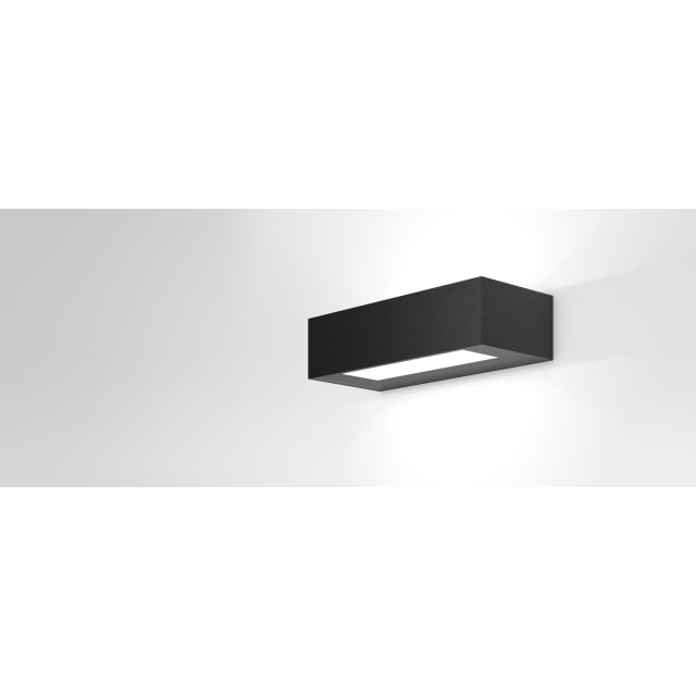 Applique rectangulaire anthracite allumée sur mur clair avec diffuseur inférieur et halo supérieur