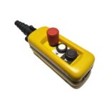 Coffret jaune incliné avec bouton rouge saillant et deux touches rondes