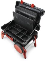 Coffret noir et rouge ouvert avec panneaux intérieurs vides, roues et pieds déployés